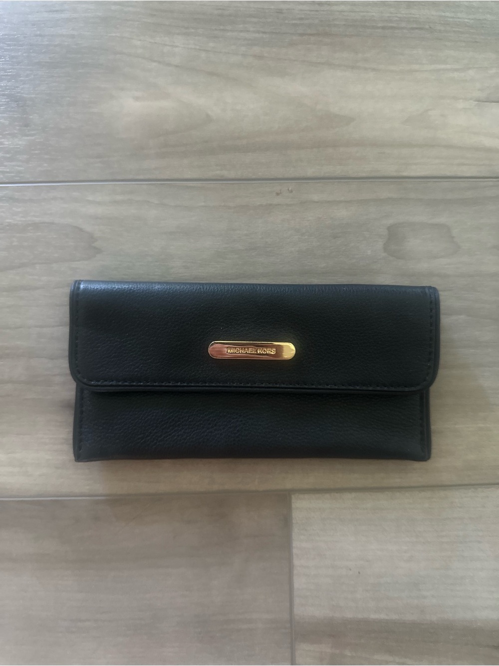 Michael Kors Black Leather Flap Wallet with Gold Plaque